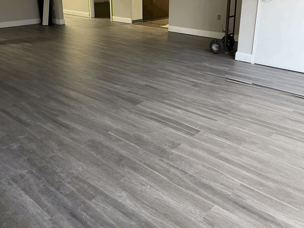 Luxury vinyl plank flooring installation – Da Jones Group